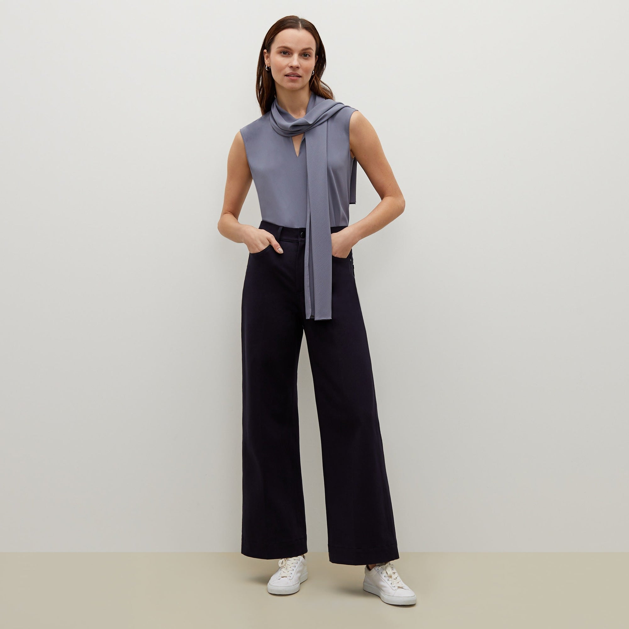 Front image of a woman standing wearing the Milo Jean in ink | Exclude