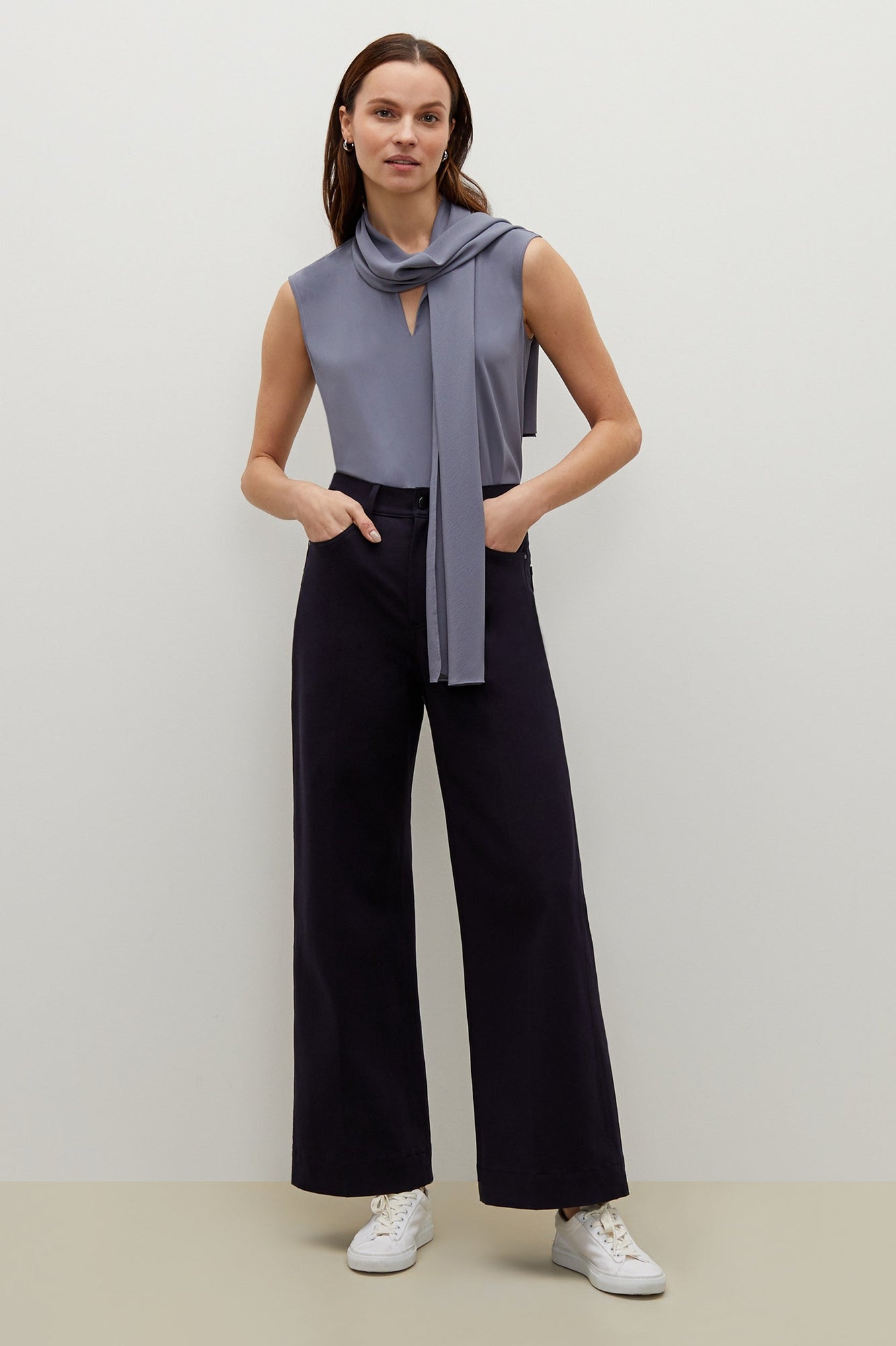 Front image of a woman standing wearing the Milo Jean in ink | Exclude