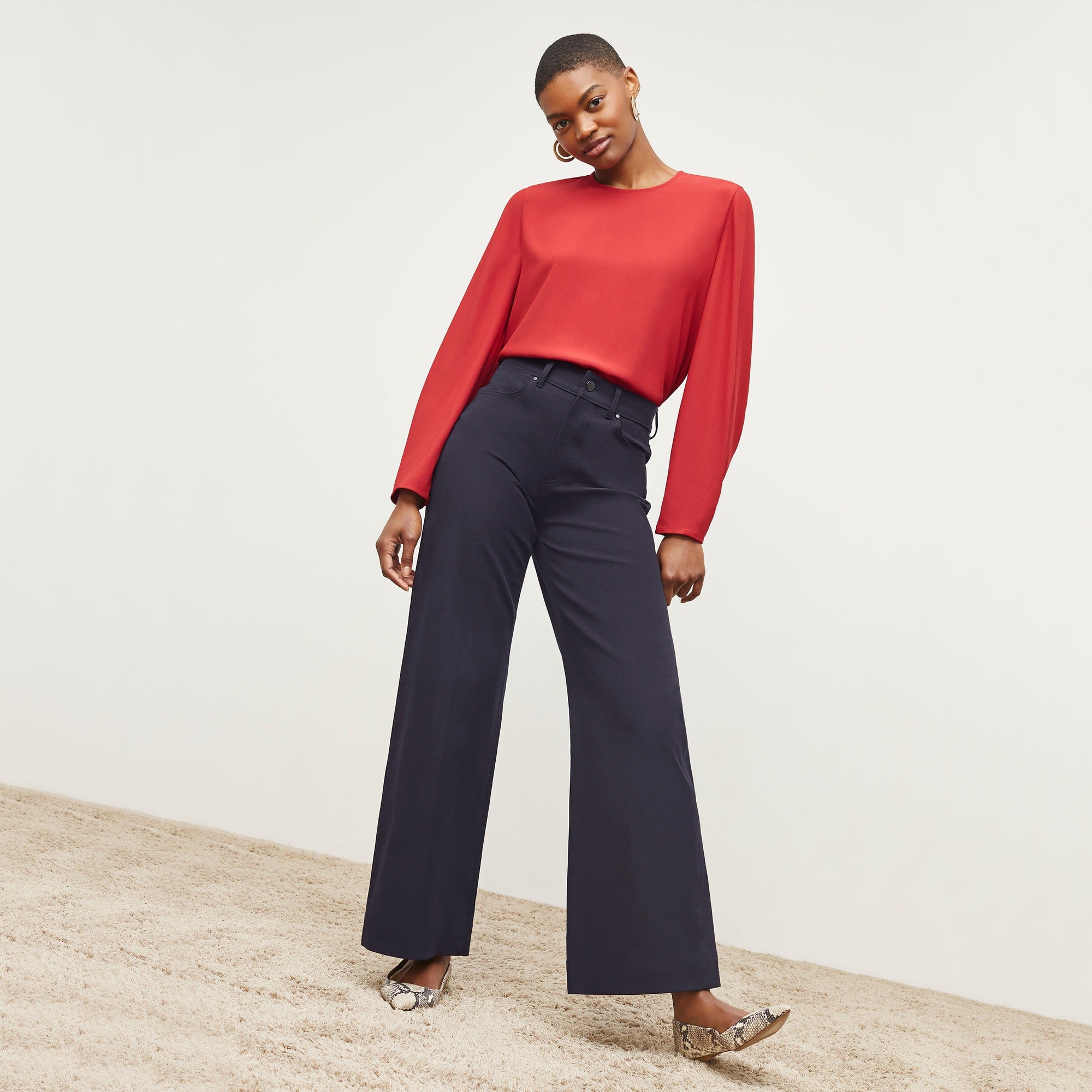 Front image of a woman standing wearing the Milo Jean in ink | Exclude