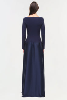 Navy satin knit gown with long sleeves and A-line skirt, shown from back view.