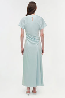 Light blue satin midi dress with short sleeves, draped side detail, and keyhole back neckline.