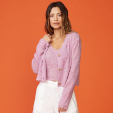 Front view of model wearing the mohair cardigan in raspberry rose.