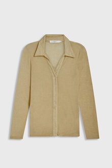 Beige long-sleeve shirt on a light gray background