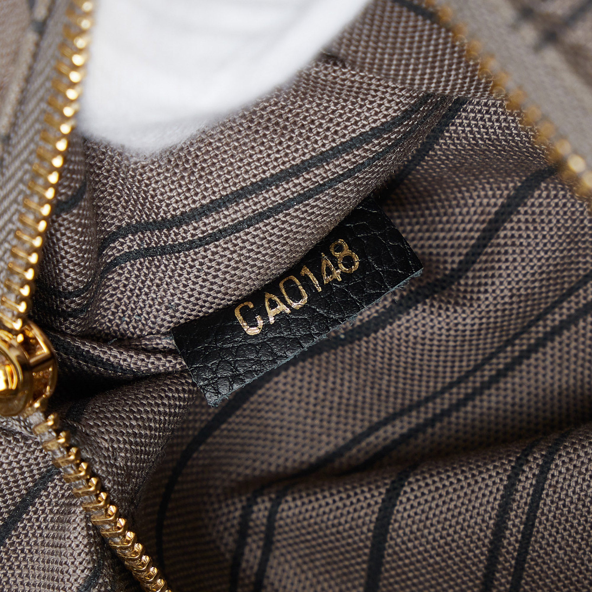 Louis Vuitton | Pre-Owned Monogram Empreinte Sorbonne | Black