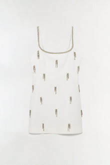 White sleeveless mini dress with beaded neckline and scattered beaded fringe embellishments throughout.