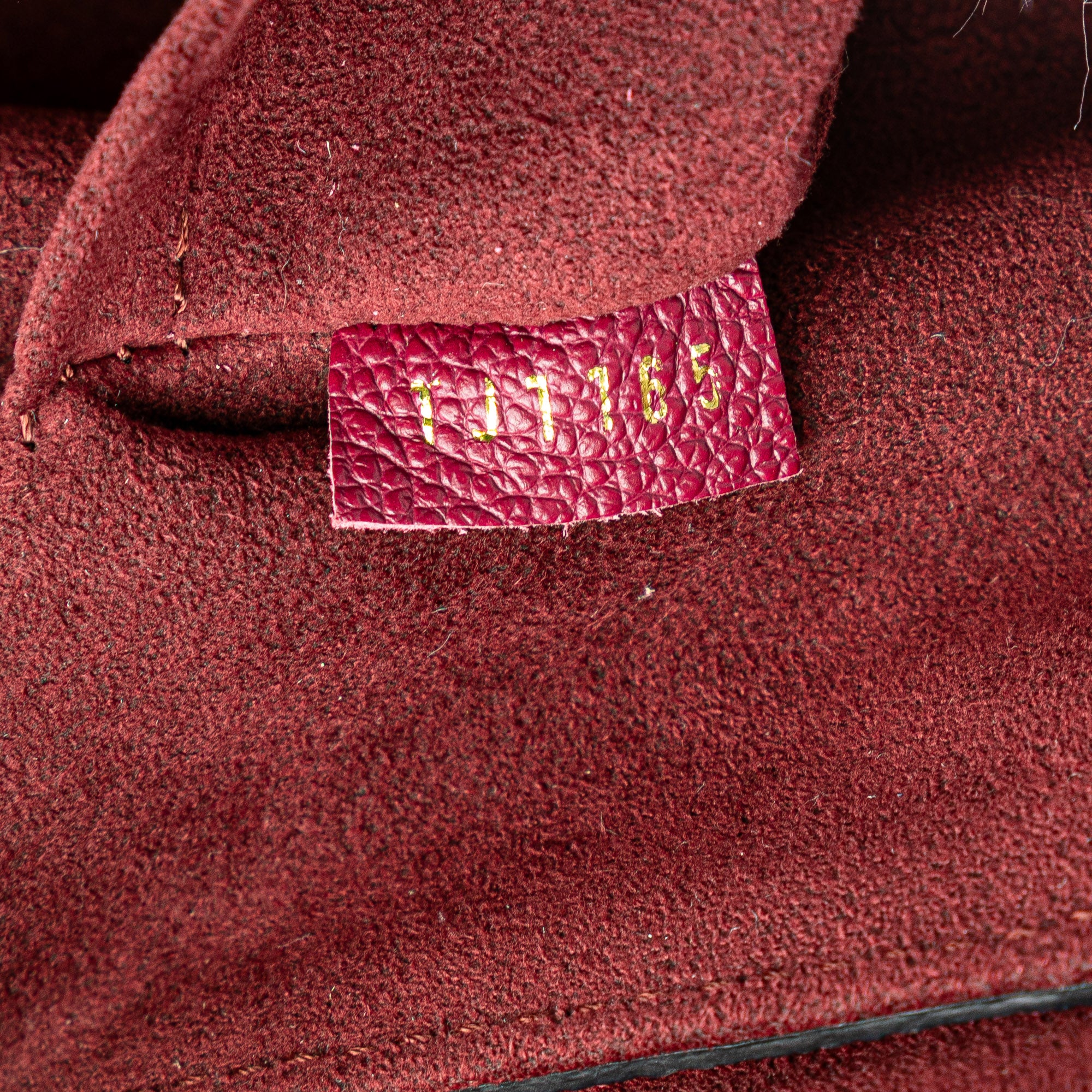 Louis Vuitton | Pre-Owned Monogram Empreinte Trocadero | Red/Bordeau