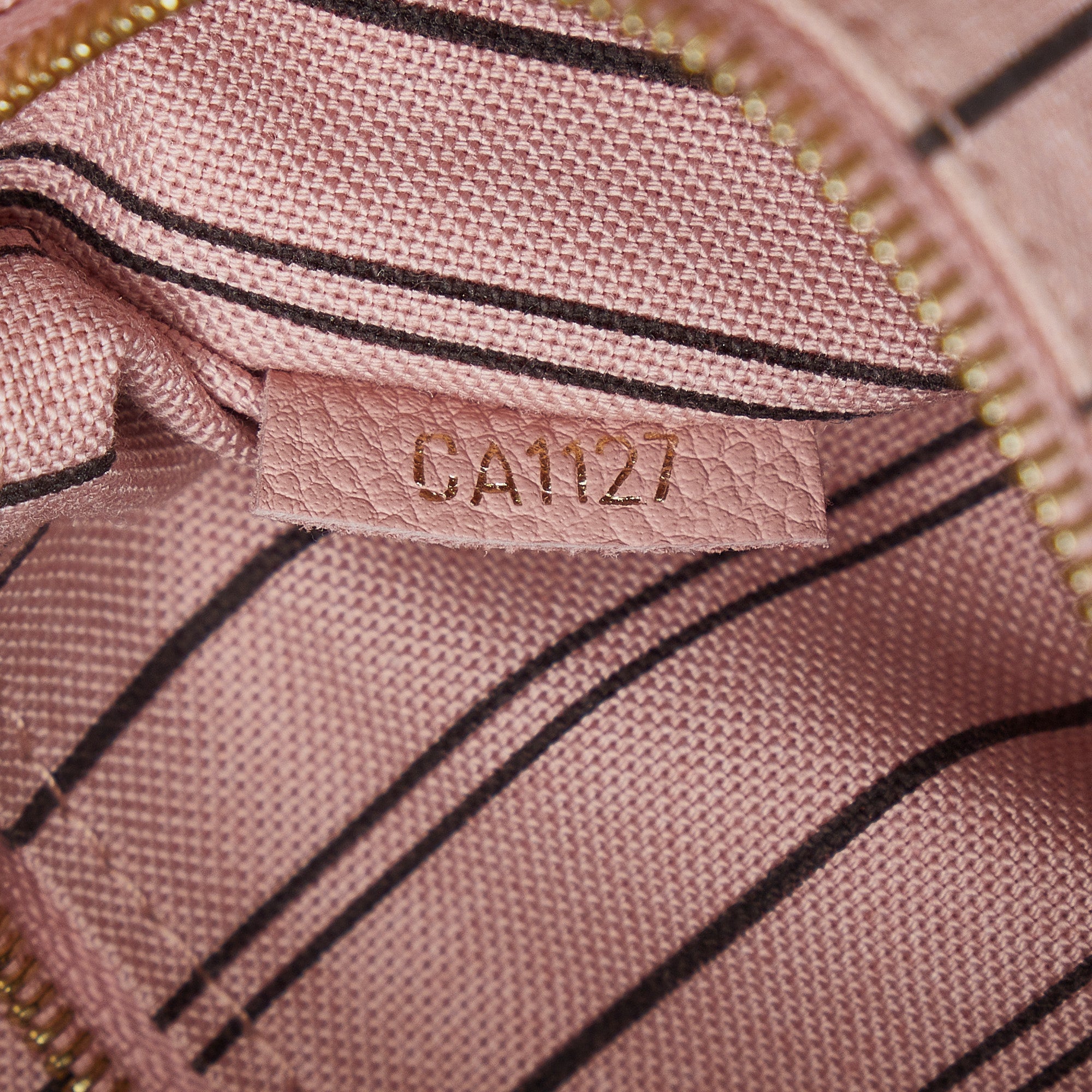 Louis Vuitton | Pre-Owned Monogram Empreinte Sorbonne | Pink/Light Pink