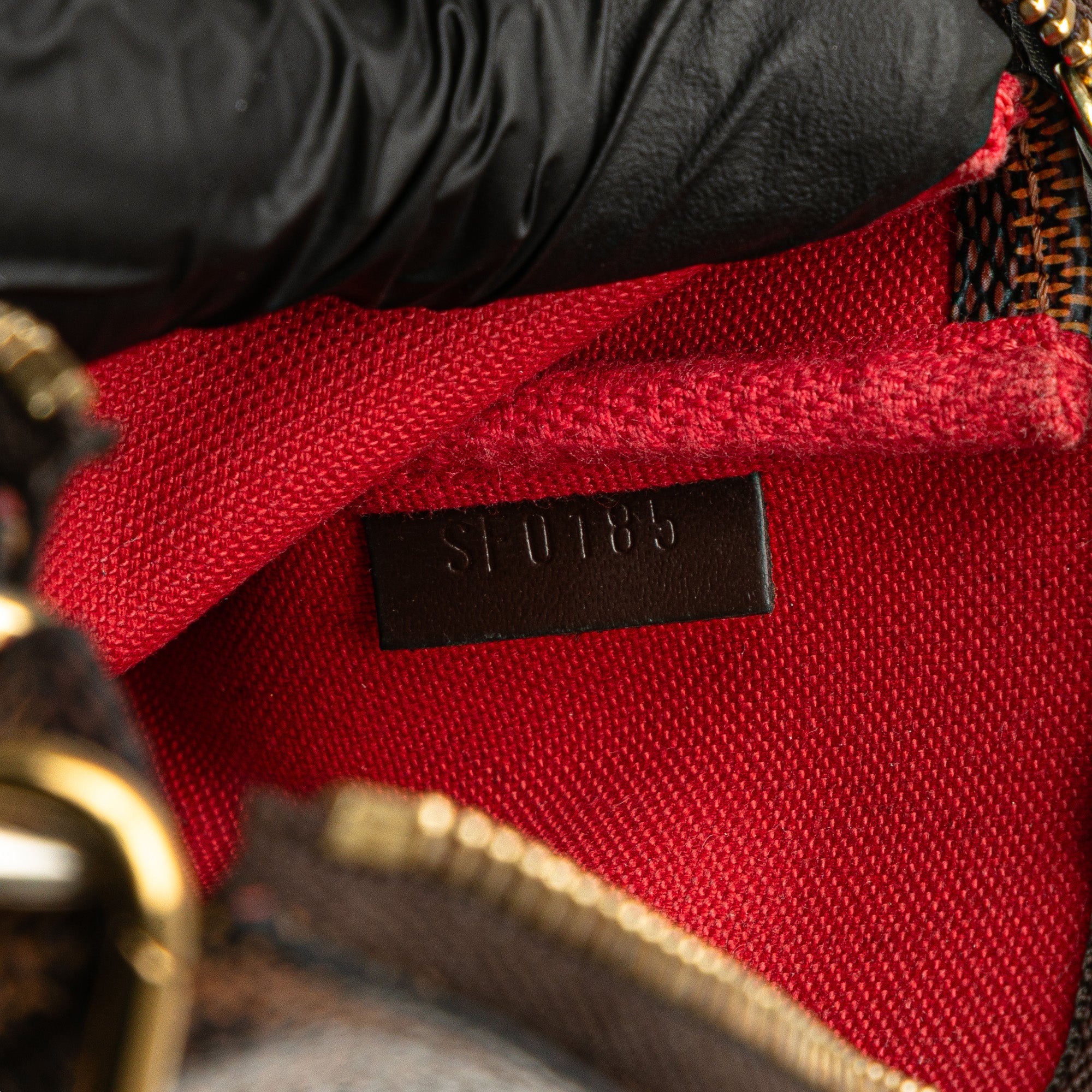 Louis Vuitton | Pre-Owned Damier Ebene Mini Pochette Accessoires | Brown