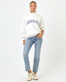 Front full-length studio view of the Crush Sweatshirt in cream, a cream quarter-zip pullover sweatshirt with 