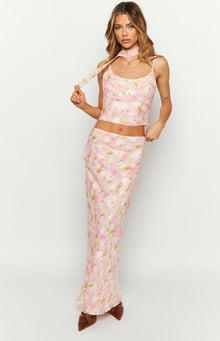 Front view of the pink floral print maxi skirt, showing its fitted silhouette and floor-length drape