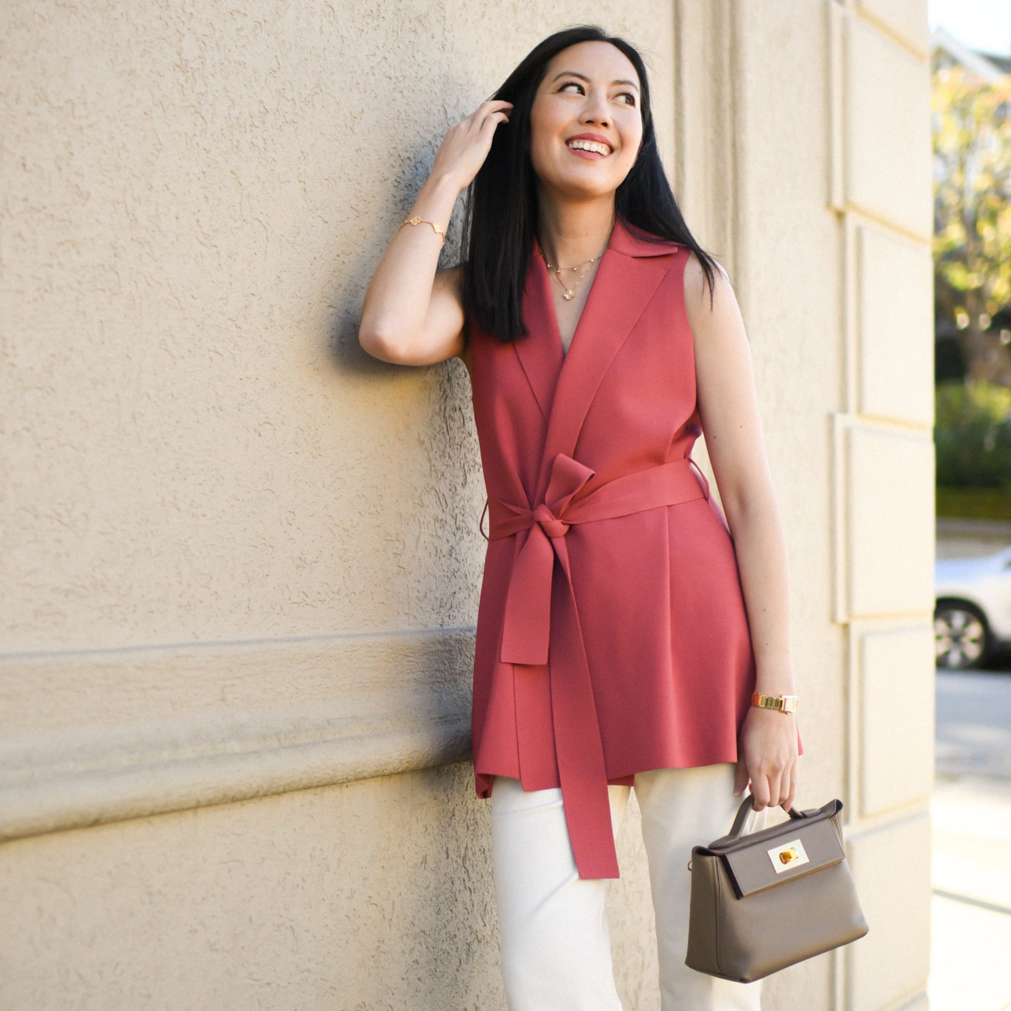 front image of Anh wearing the anh jardigan in carnation