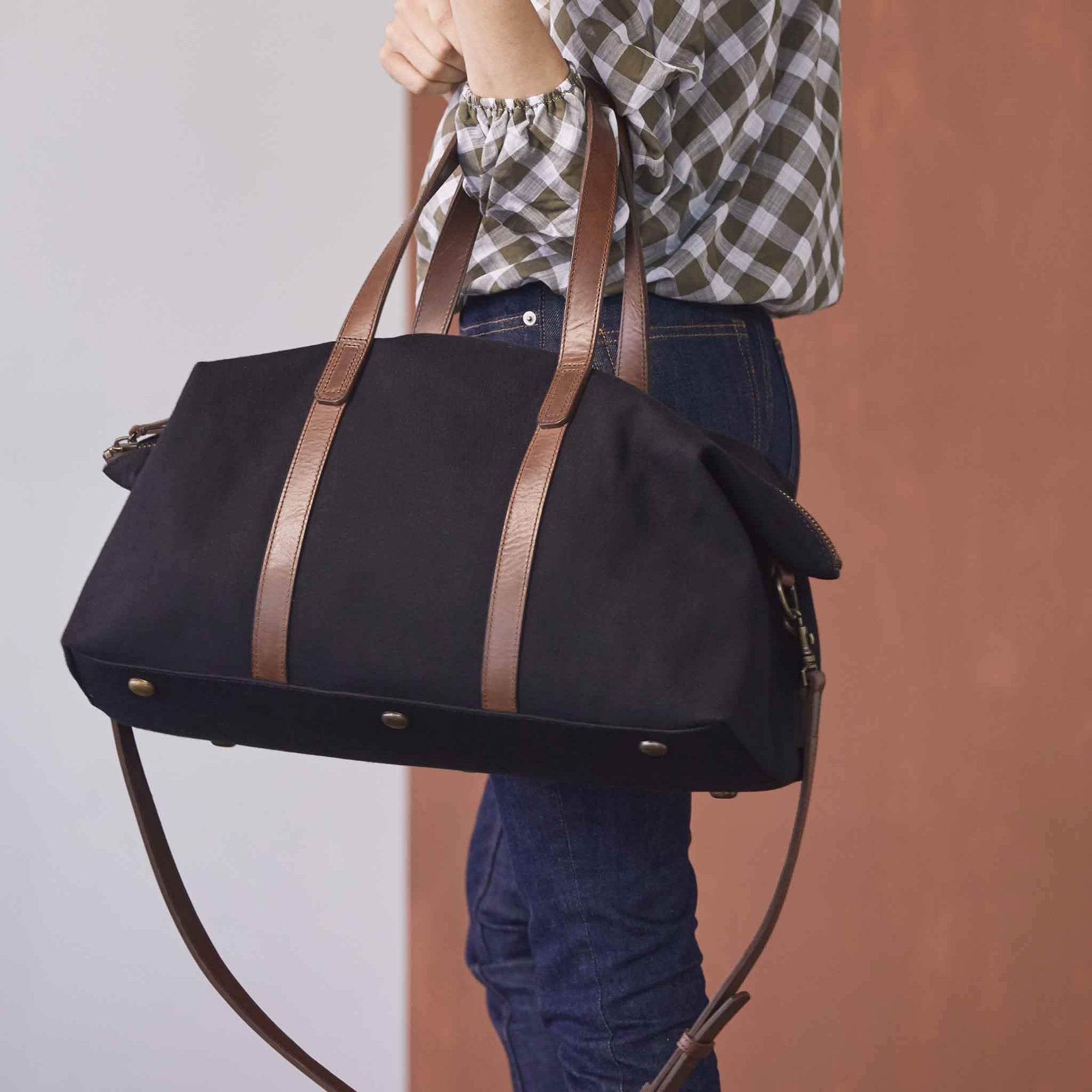 Image 2 of the Canvas Weekender Black on model