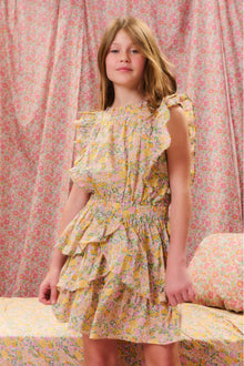 Girls floral printed dress with a ruffle-trimmed collar, buttons down center front, flutter sleeves, an elastic waist and overlapping asymmetrical ruffles at the skirt.