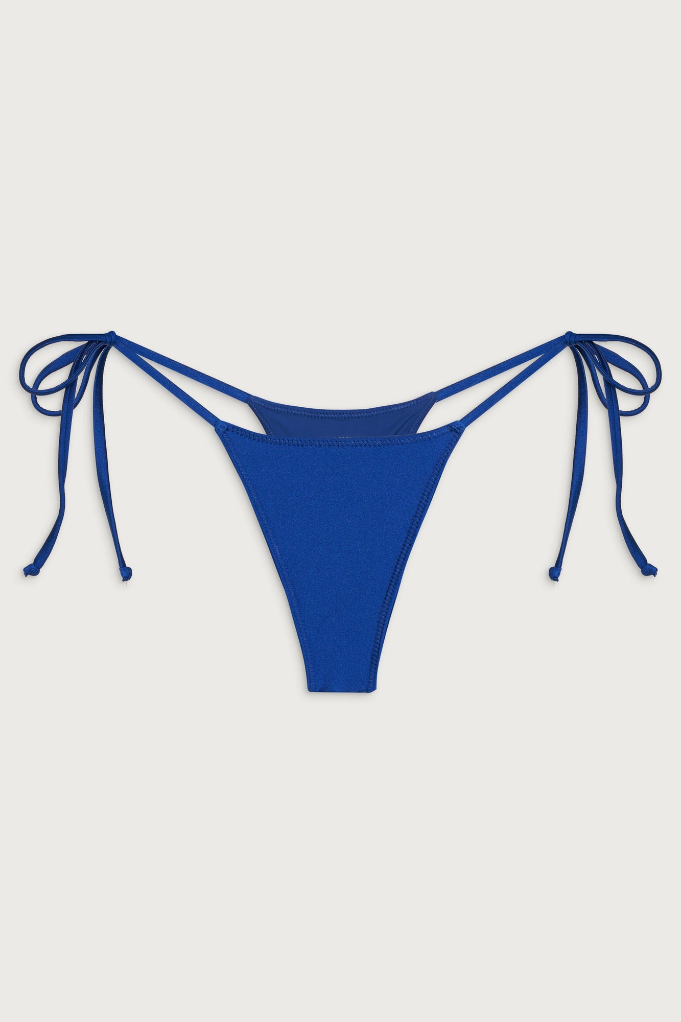 Divine skimpy bikini bottom deep blue