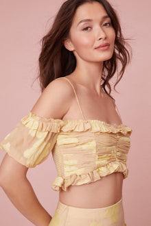 Cropped off-shoulder made from soft fil coupe silk blend with a custom floral design