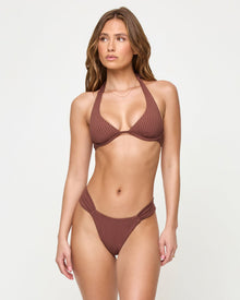 Cafe | Badge:Eco-Friendly_#B2AC88_#ffffff'
Woman wearing a brown bikini against a white background
