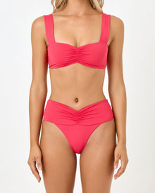 close up view of Pink bikini set on a white background
