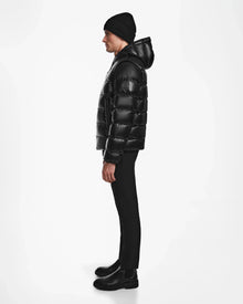 A man in a black Rudsak DEMIAN S-R - M123505 RDS-certified down 2-in-1 jacket and vest.