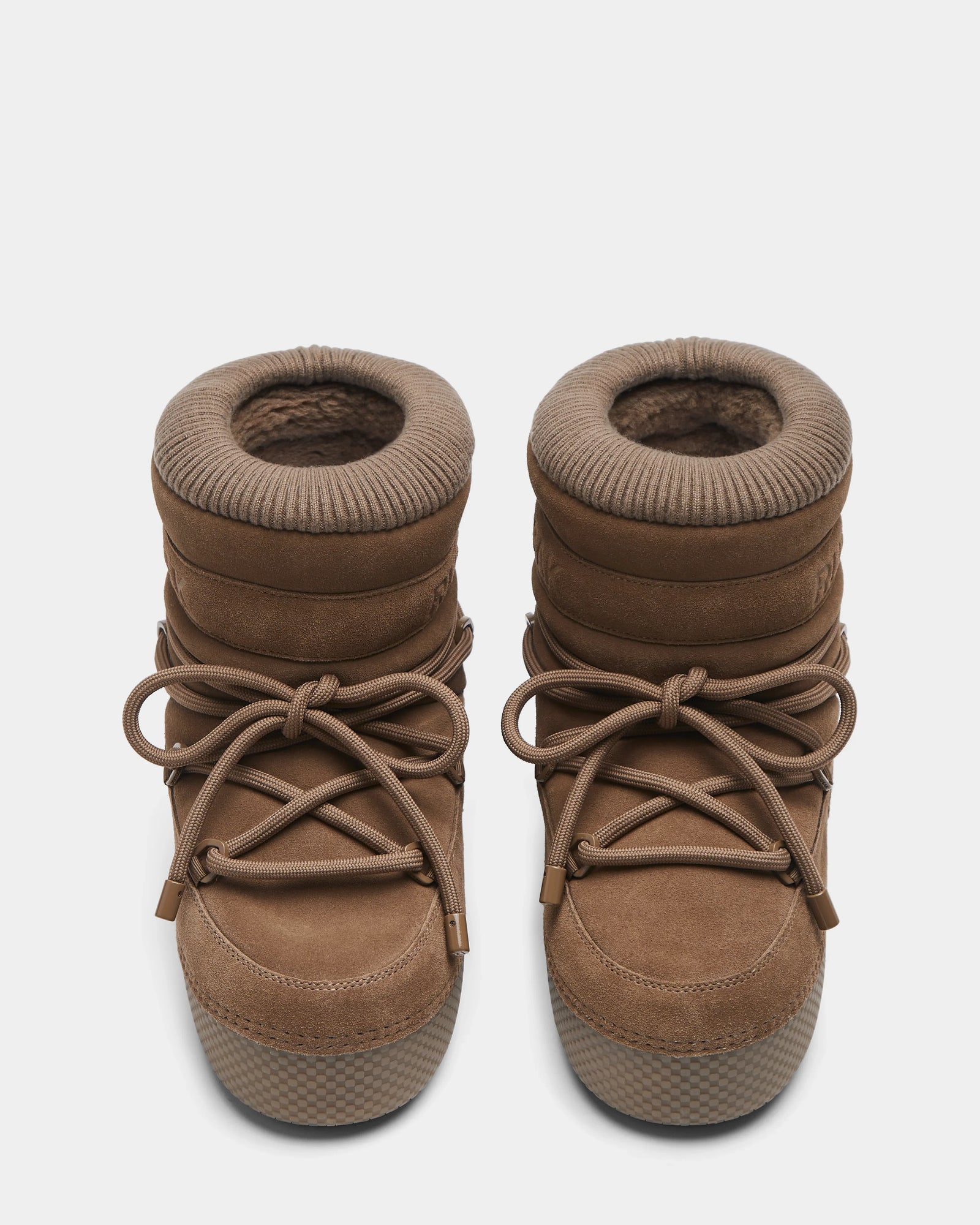 A pair of Rudsak MACE S - 8224543 Camel women's brown suede, water-repellent short moon boots with thick textured soles, rounded toes, padded ankle collars, and crisscrossed laces seen from above on a white background.