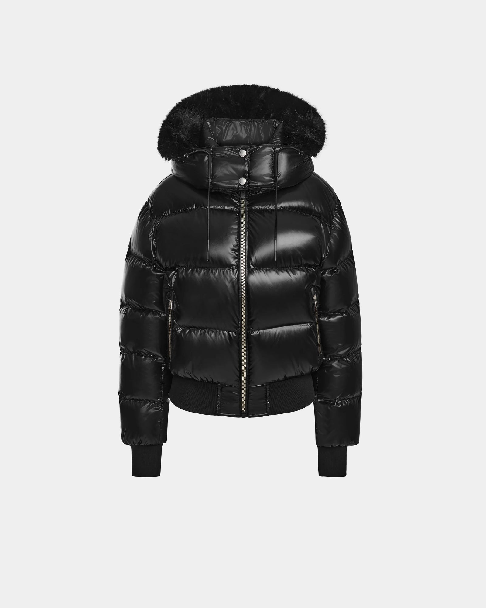 The Rudsak MAUDE Q-S - L124553 Black is a women's shiny black quilted down bomber jacket with a fur-lined hood, front zipper closure, ribbed cuffs and hem, displayed against a plain light background.