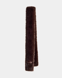 The Rudsak CARMY - L425534 Espresso women’s faux-fur scarf stands neatly folded upright against a light gray background, offering plush warmth as a stylish cold-weather accessory.