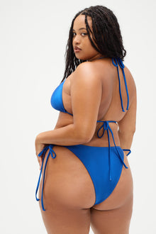 Divine skimpy bikini bottom deep blue