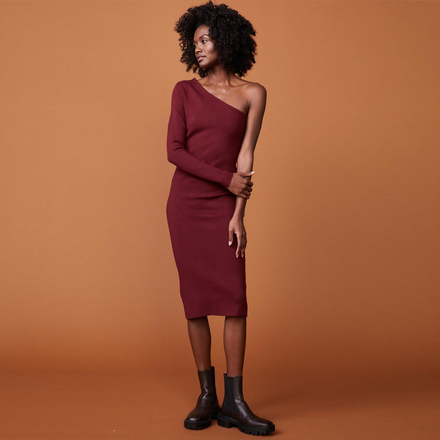 Front view of model wearing the supersoft sweater knit one shoulder dress in rhubarb.