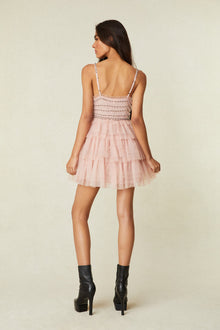 mini Dress features a ruched body adorned with crystal embellishments and a flirty multi-tiered tulle skirt.