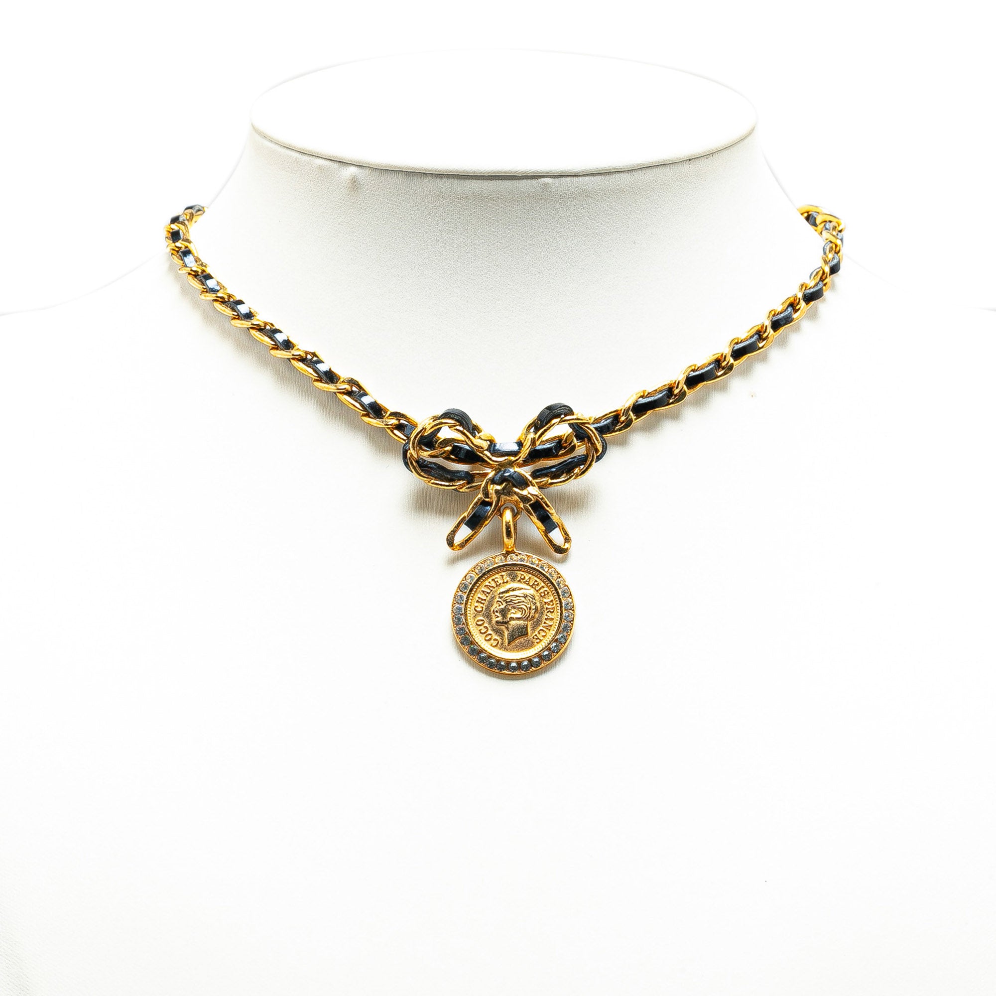 Chanel | Pre-Owned Leather and Gold Plated Medallion Bow Pendant Necklace | Gold