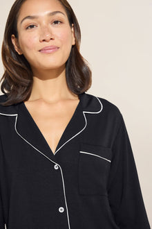 Model wears Gisele TENCELâ„¢ Modal Long Sleeve & Shortie Short PJ Set in black/sorbet pink.