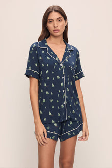 Model wears Gisele Printed TENCELâ„¢ Modal Relaxed Short PJ Set in Woodland Pine Navy/Ivory.