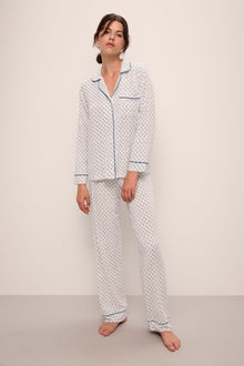 Model wears Gisele Printed TENCELâ„¢ Modal Long PJ Set in Petite Batik Ivory/Denim Blue.