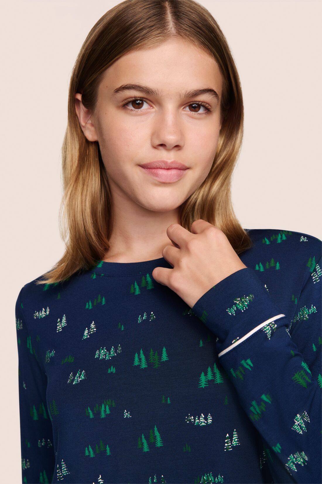 Model is wearing Gisele Printed TENCEL Modal Crewneck PJ Set in Forest Pine Navy/Ivory