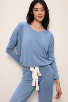 Model wears Gisele TENCELâ„¢ Modal Slouchy PJ Set in wedgewood blue/ivory.