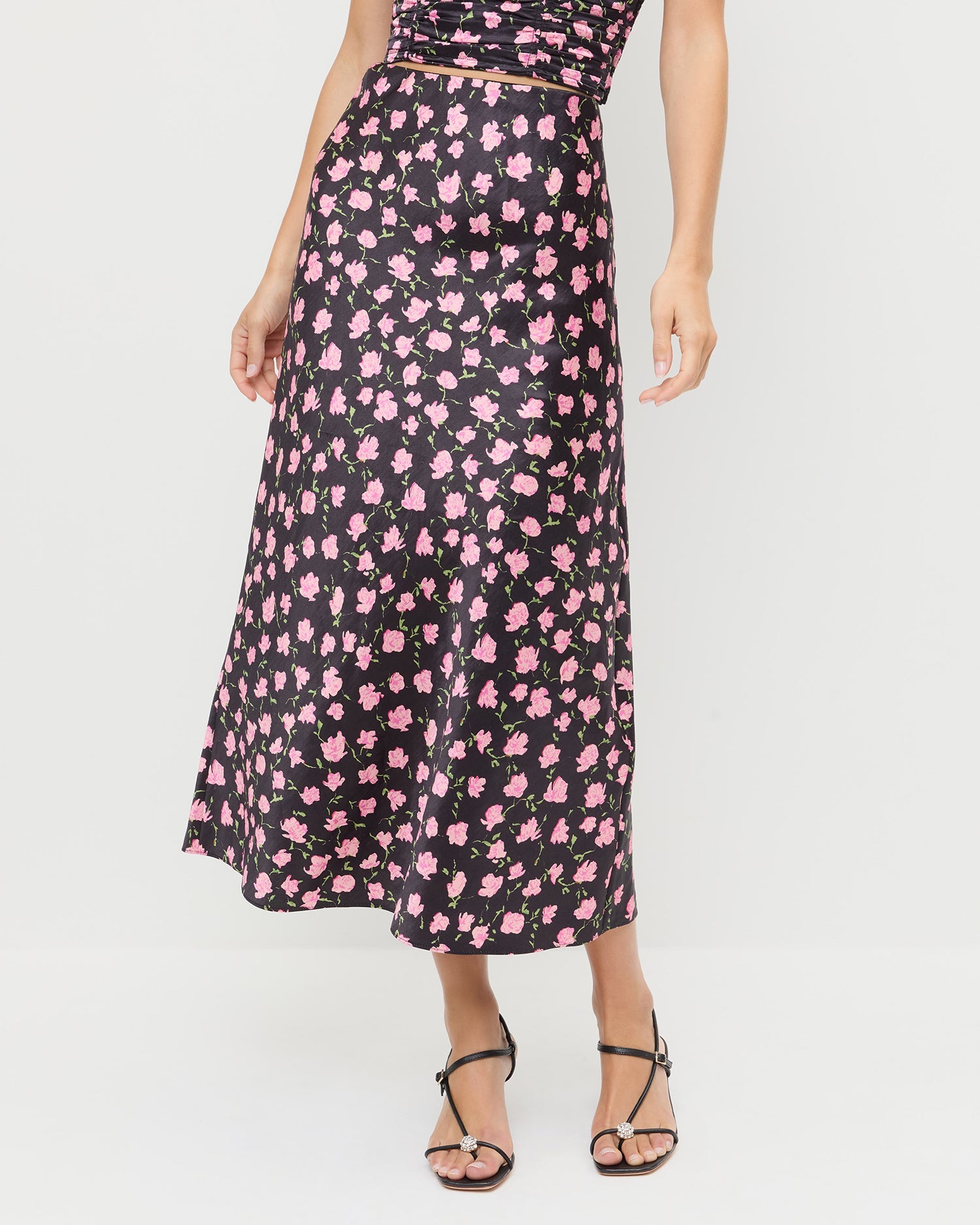 Mandy Midi Skirt in black rosette textured fabric, Cresta Top in black rosette textured fabric, and Triana Black/Crystal Mid-Heel Sandal.