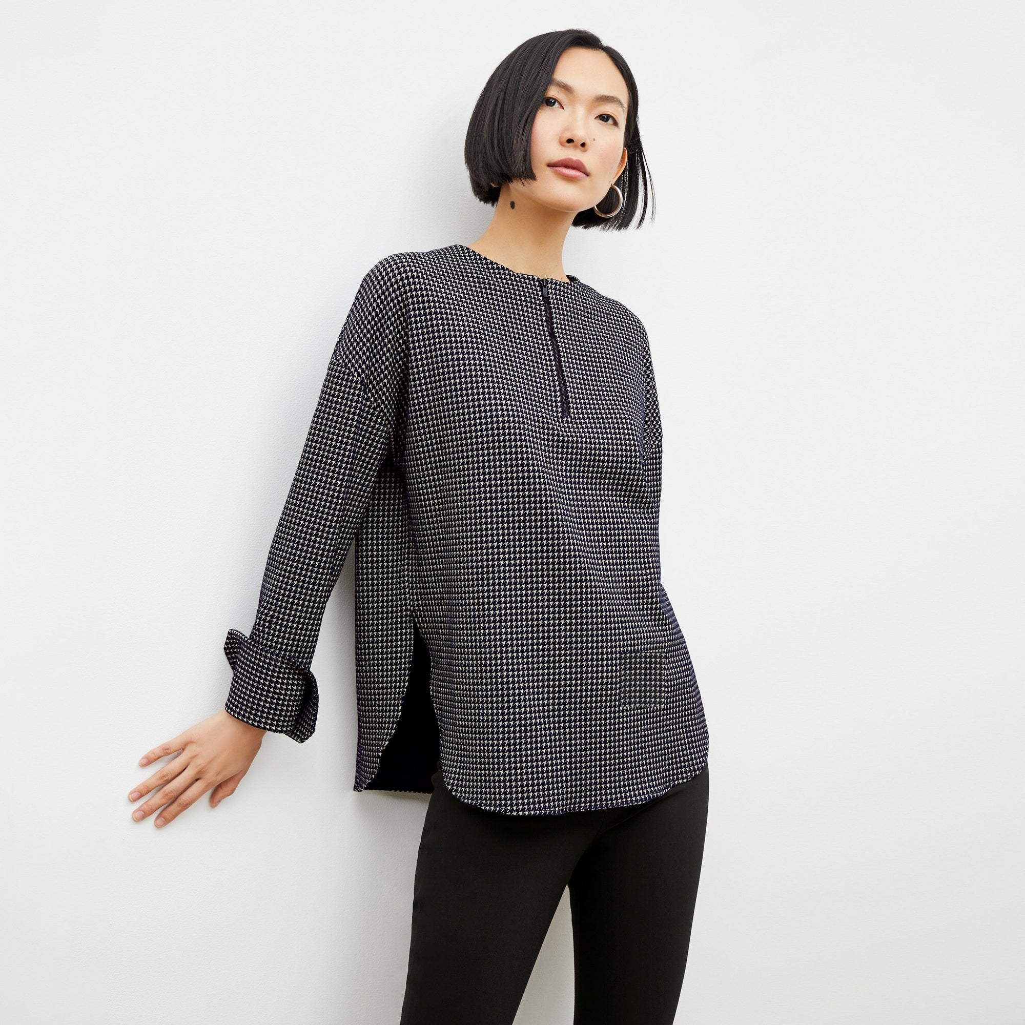 Front image of a woman wearing the tully top in black and white