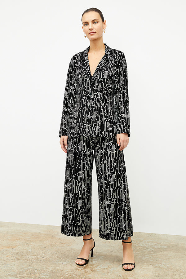 front image of a woman wearing the alyssa jacket in symphony print | Exclude