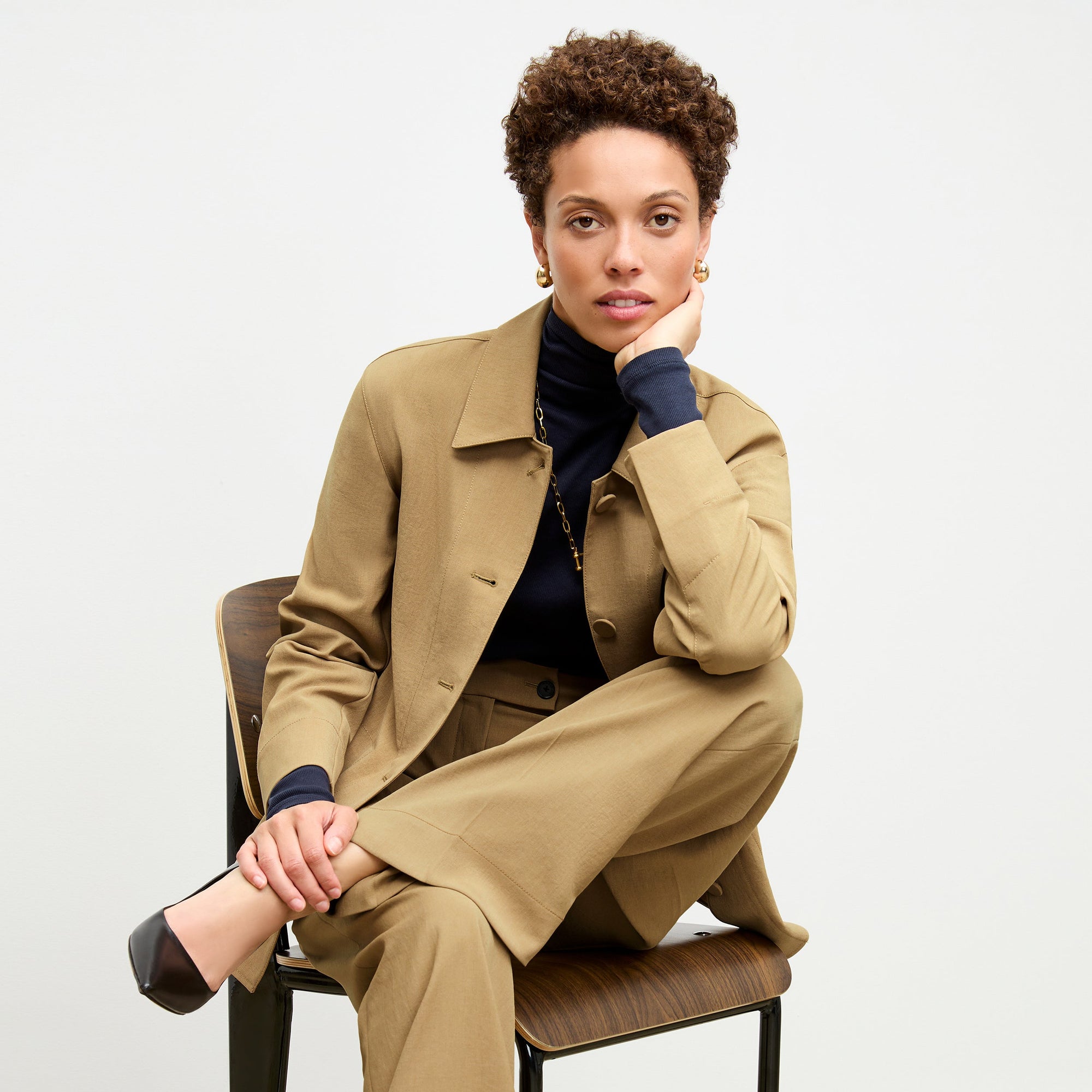front image of a woman wearing the avelyn jacket in macaroon | Exclude