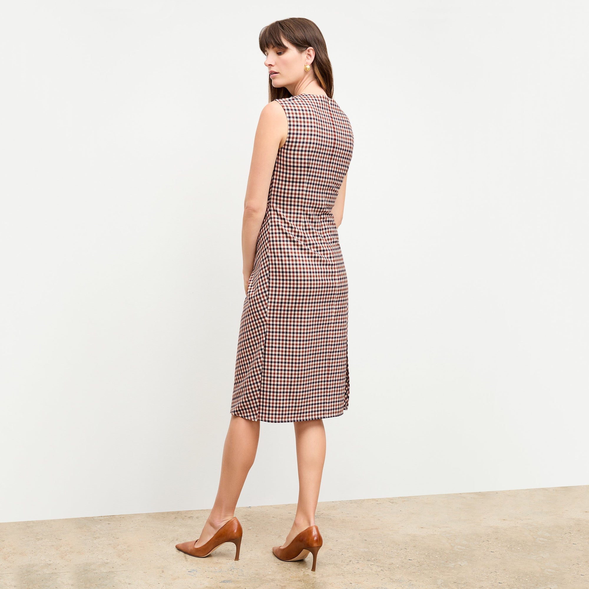 back image of a woman wearing the jeannine dress in windowpane sharkskin