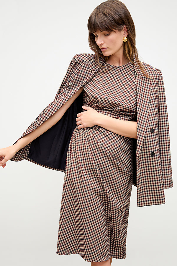 front image of a woman wearing the jeannine dress in windowpane sharkskin | Exclude | Grid Hover