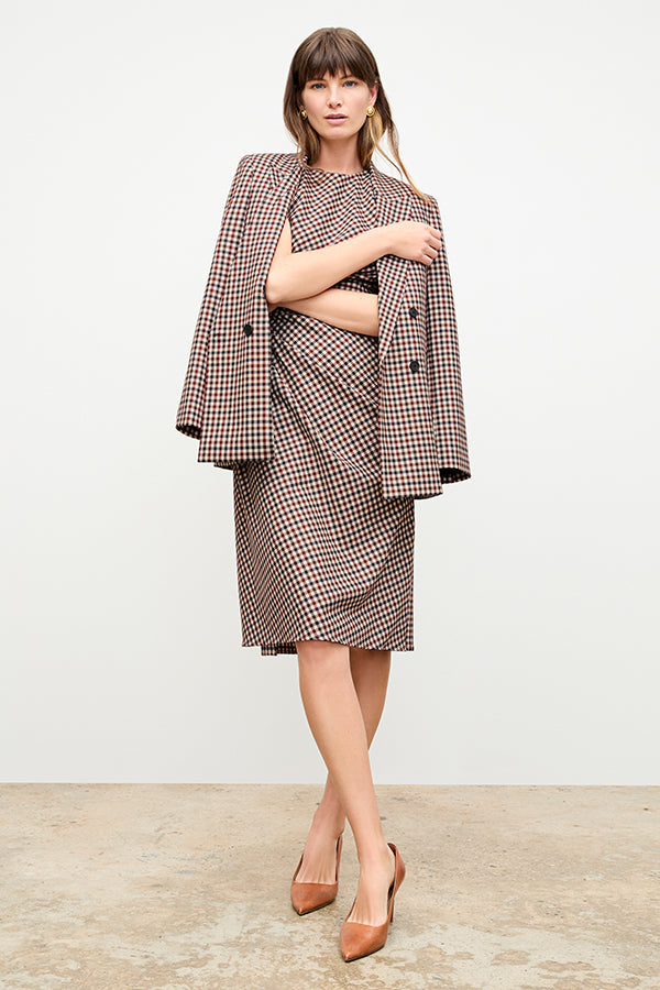 front image of a woman wearing the jeannine dress in windowpane sharkskin | Exclude