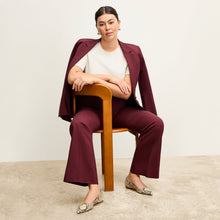 front image of a woman wearing the horton pant in shiraz