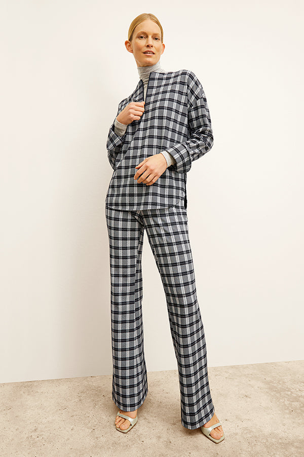 front image of a woman wearing the tully top in checkmate | Exclude | Grid Hover