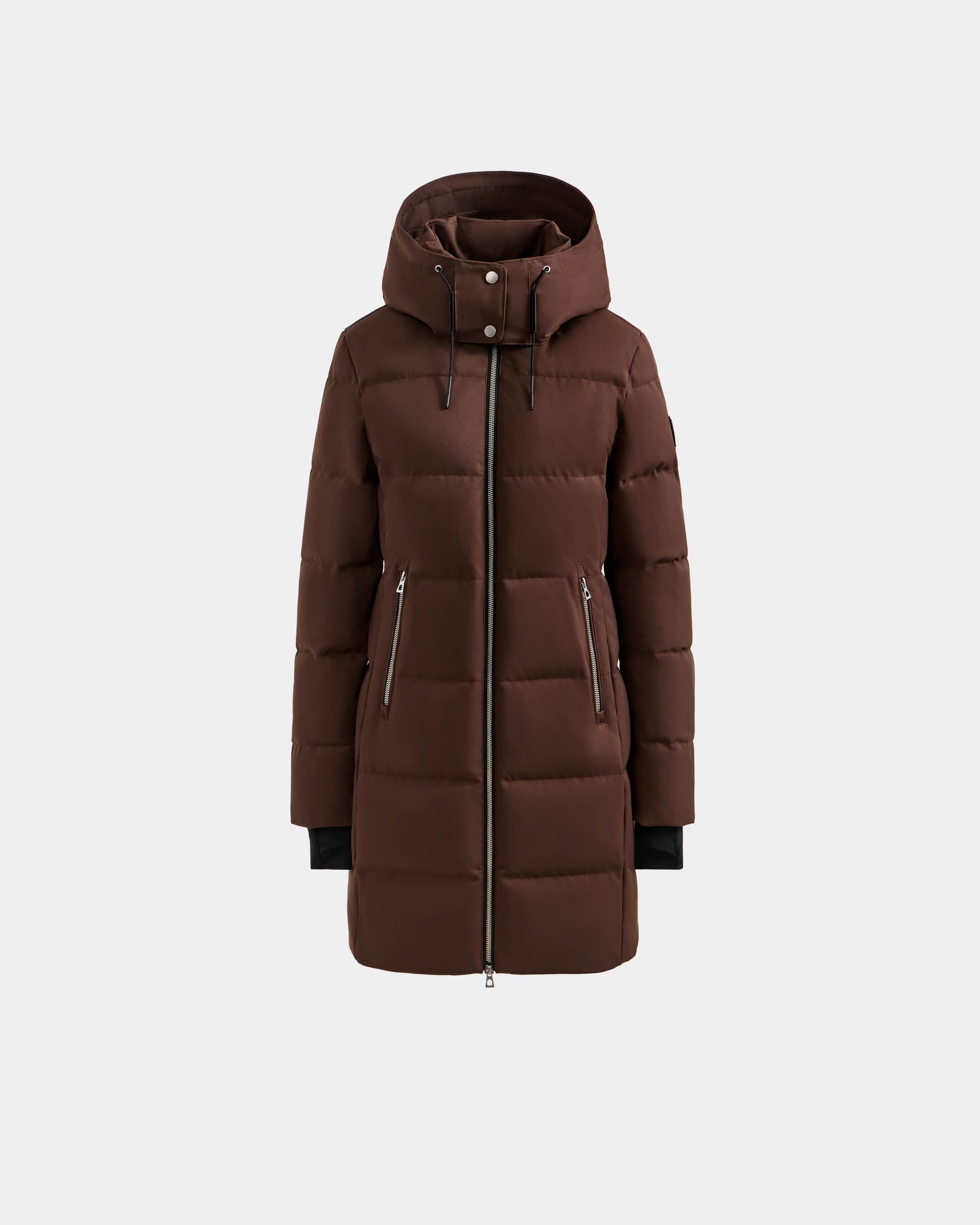 The Rudsak MIRIAM - L123544 Mocha is a long brown women’s down puffer jacket with hood, front zipper, zippered pockets, and black cuffs—an essential winter piece shown on a plain light background.
