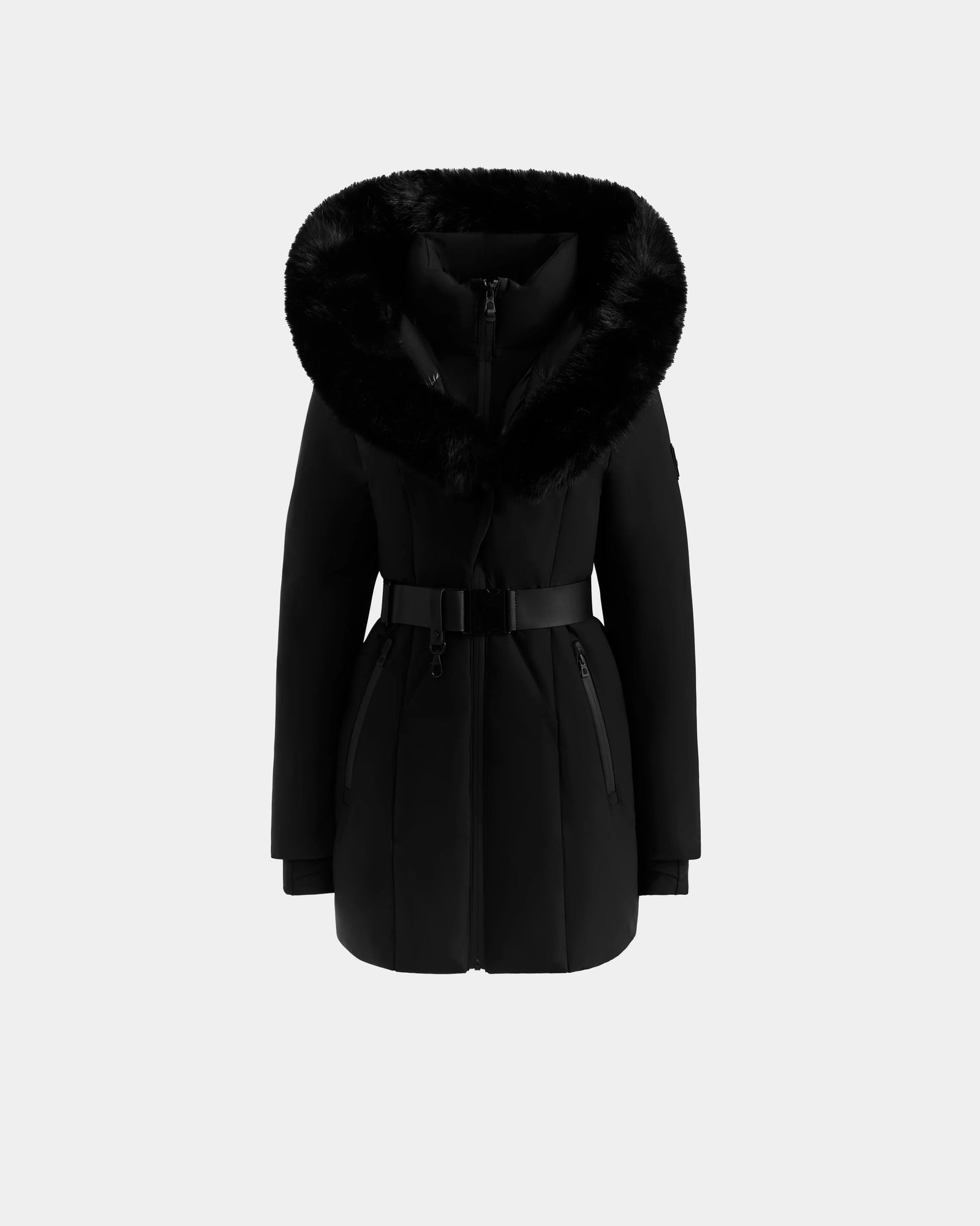 The Rudsak MODA M - L125555 Black is a black winter coat with a wide faux fur-trimmed hood, front zipper, two zippered pockets, long sleeves, and a matching vegan leather belt, shown on a plain light gray background.