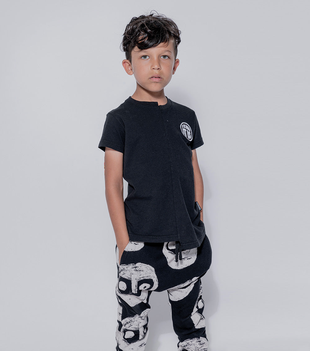 Kid | Light The Warriors Baggy Pants | Red