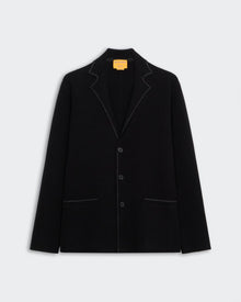 Off Duty Blazer - Black displayed flat, featuring three buttons and contrast white stitching on lapels and pockets.