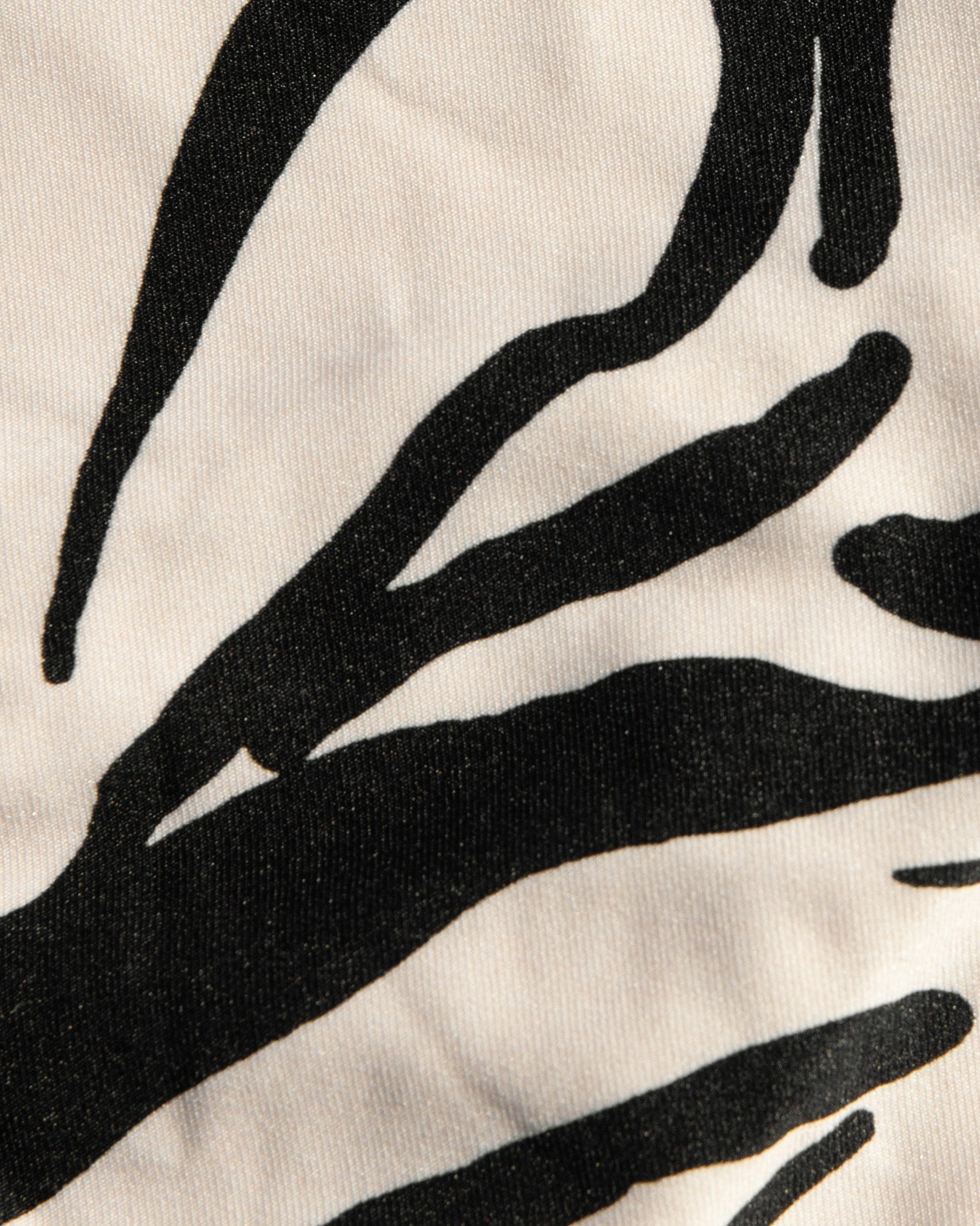 Black abstract leaf pattern on a white background