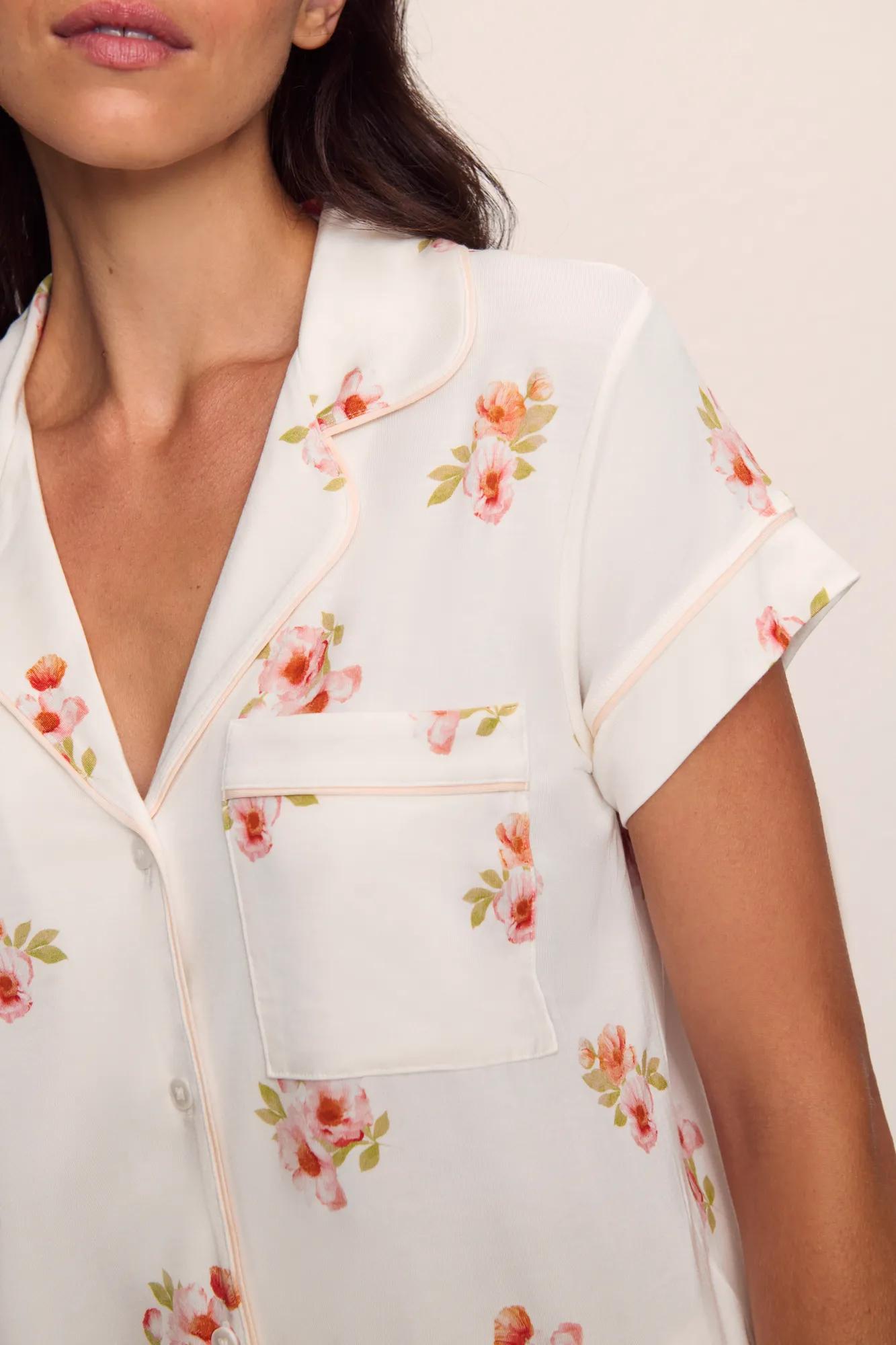 Model is wearing Gisele Printed TENCEL Modal Short Sleeve Cropped PJ Set in  Floral Bloom Ivy/Vanilla Cream