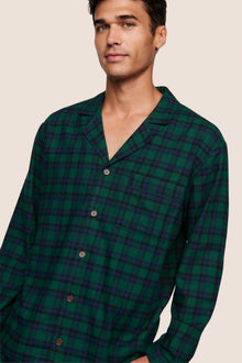 Model is wearing Men's Flannel Long PJ Set  in Black Watch Tartan Rainforest/Navy